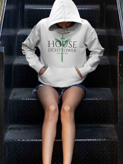 hoodie mockup of a young woman sitting on some steps 33744