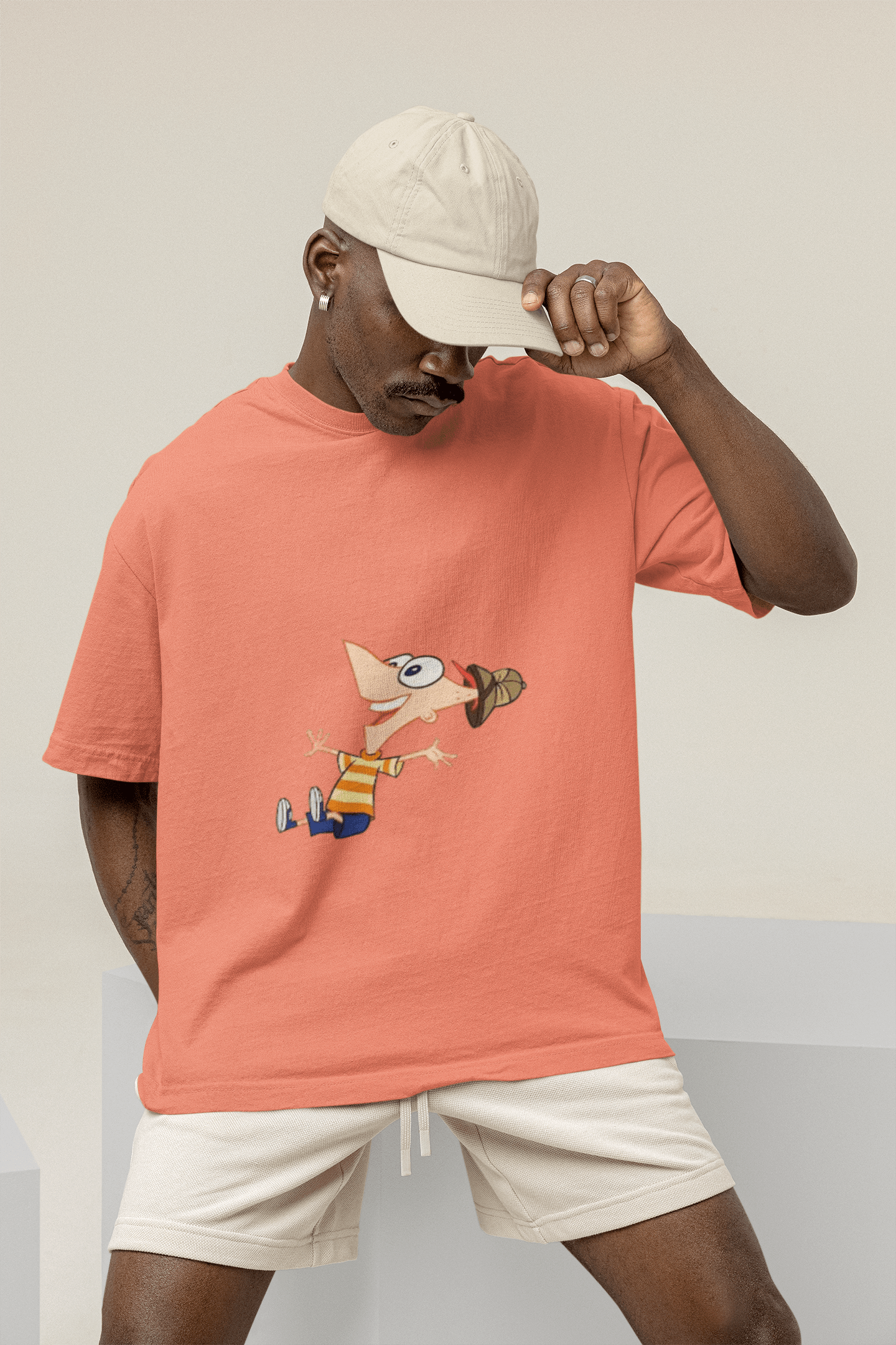 mockup of a man wearing a wide t shirt at a studio m26233 2 min