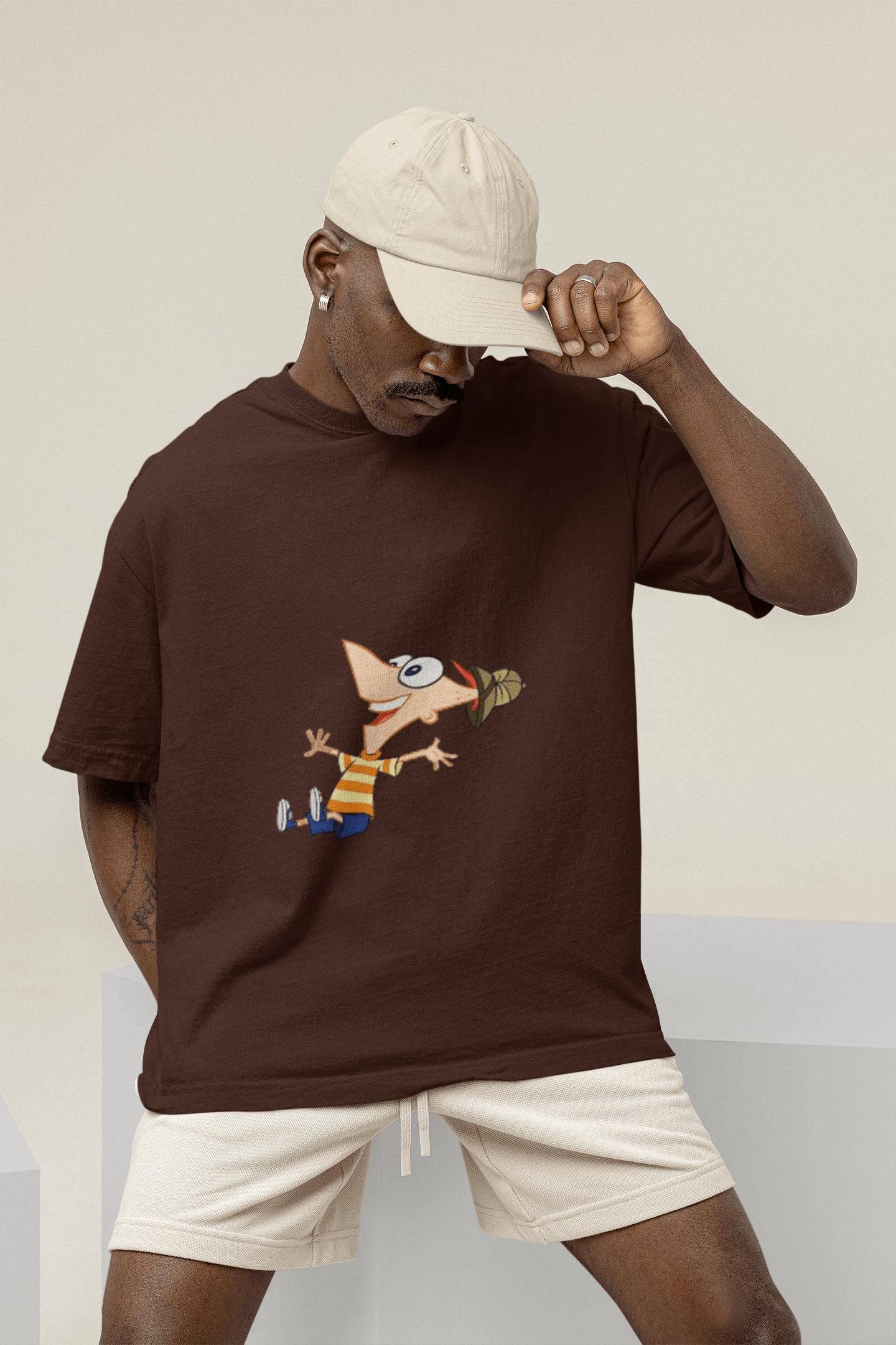 mockup of a man wearing a wide t shirt at a studio m26233 3 min