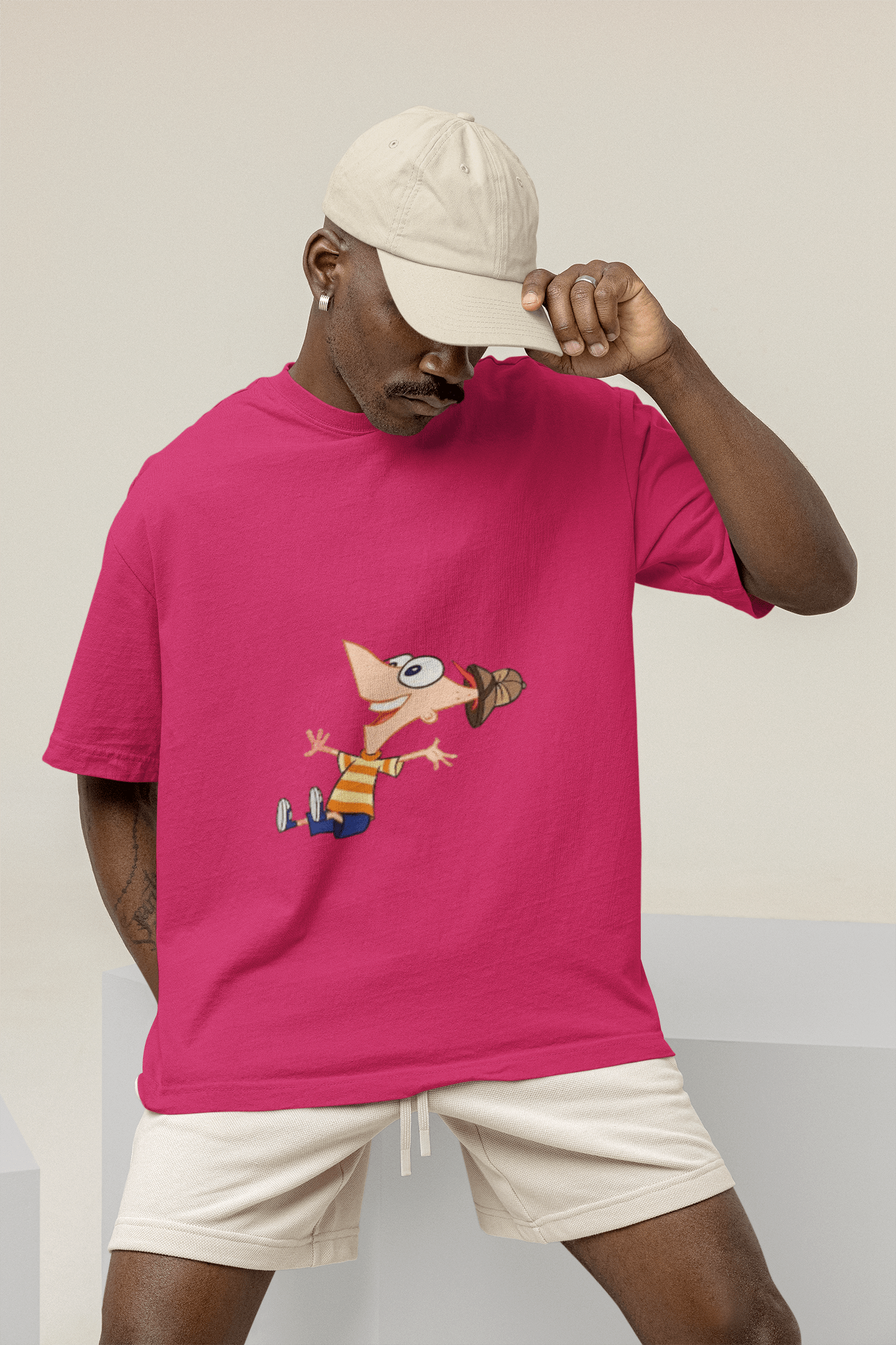 mockup of a man wearing a wide t shirt at a studio m26233 4 min