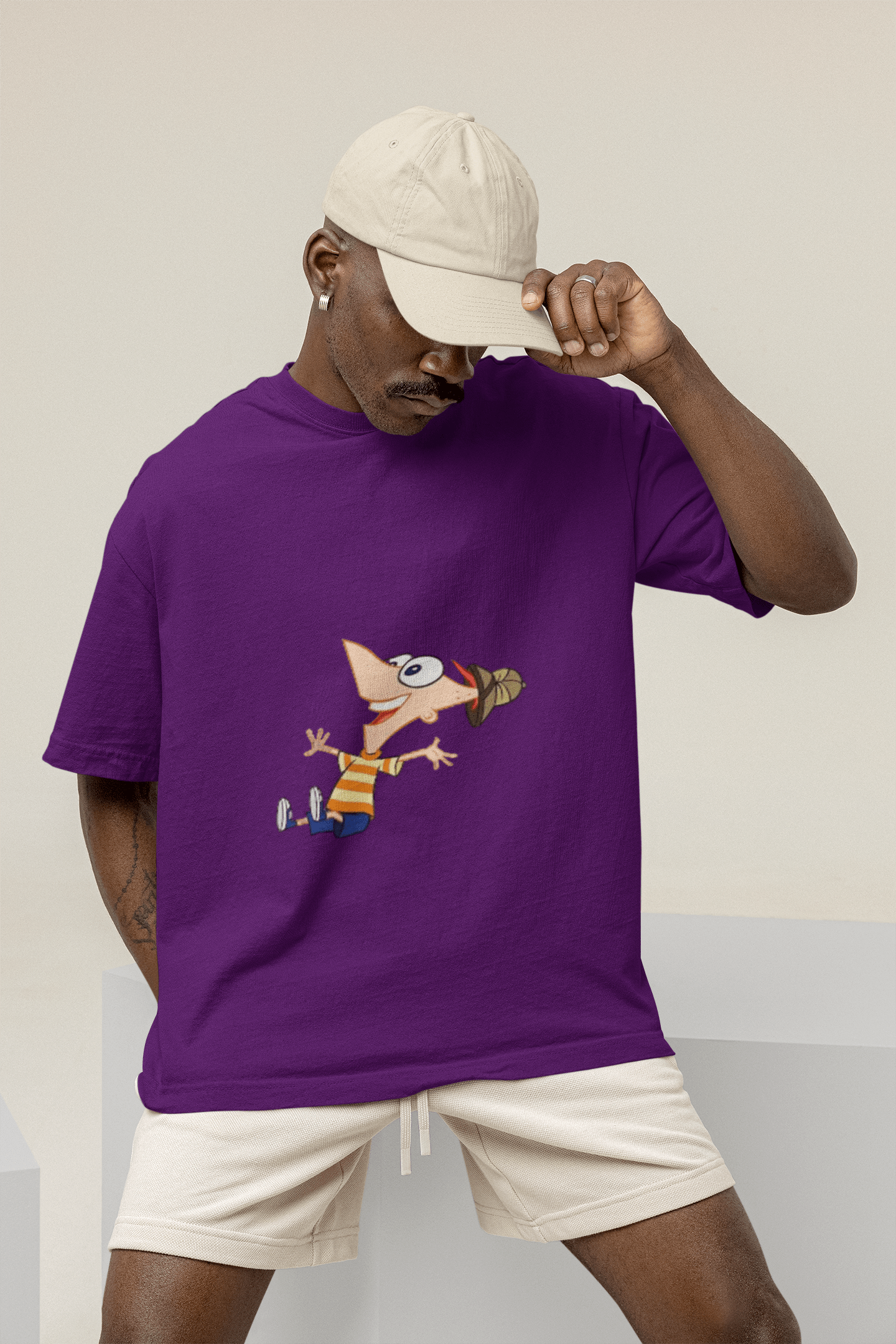 mockup of a man wearing a wide t shirt at a studio m26233 7 min