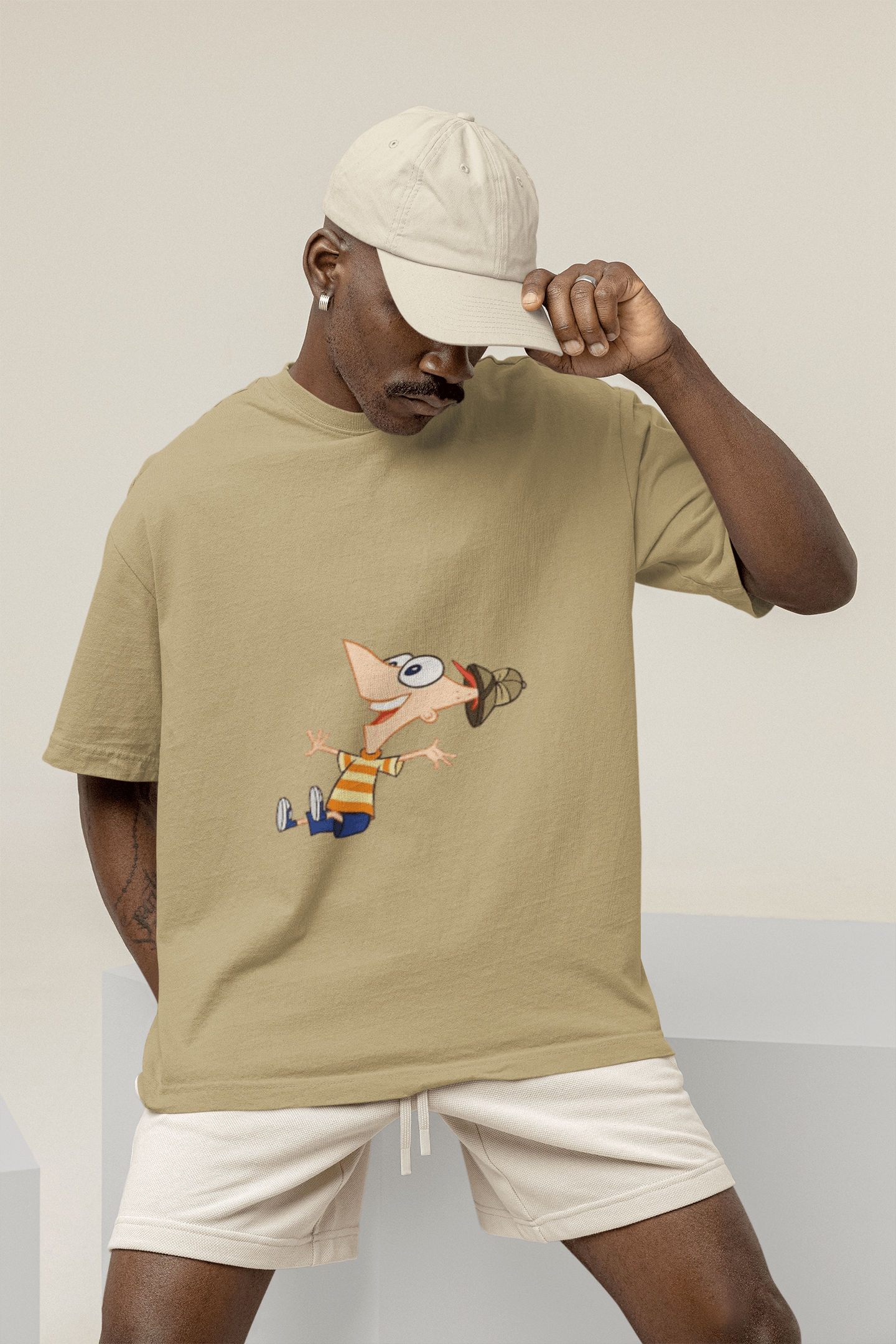 mockup of a man wearing a wide t shirt at a studio m26233 8 min