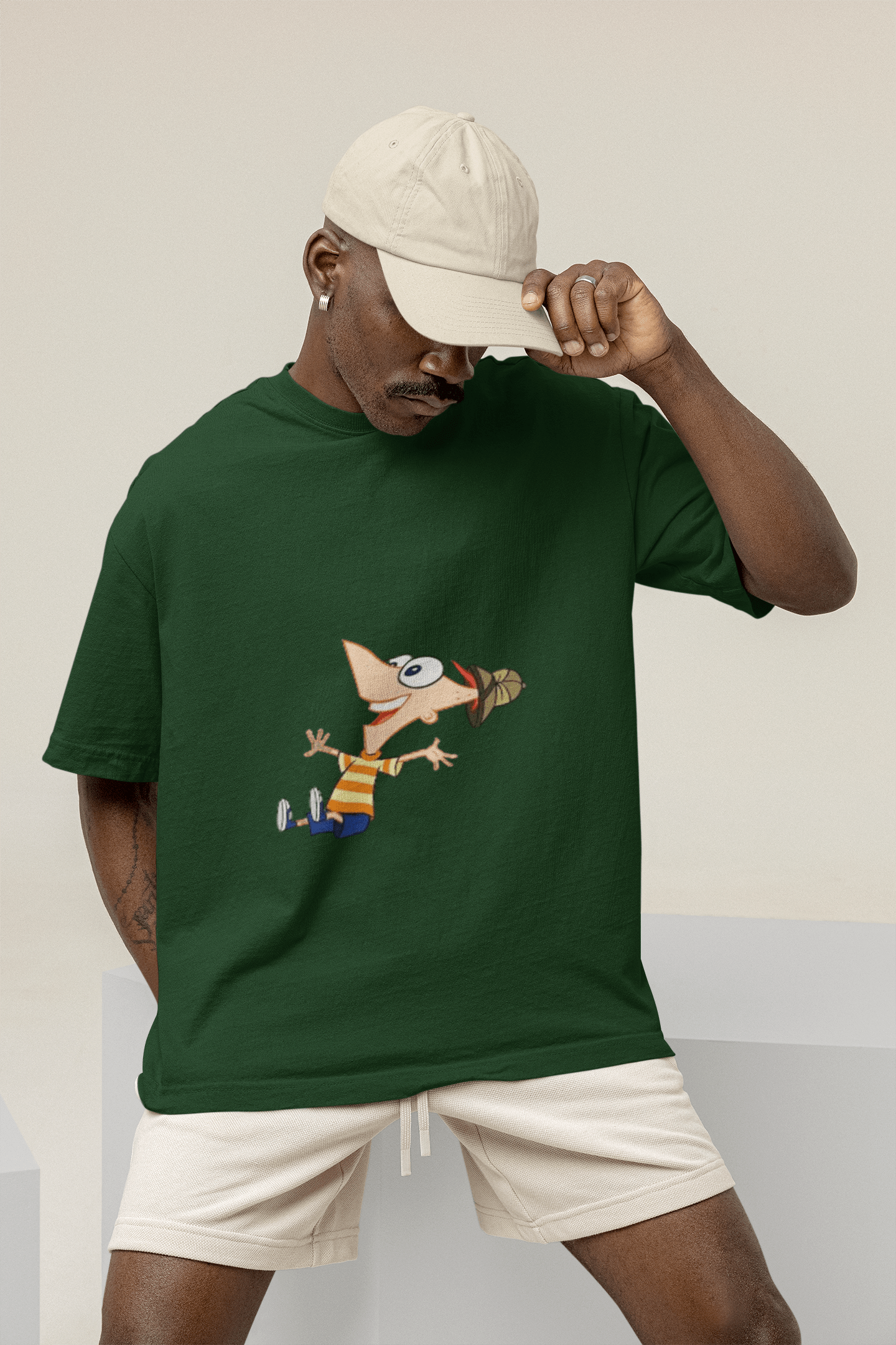 mockup of a man wearing a wide t shirt at a studio m26233 9 min