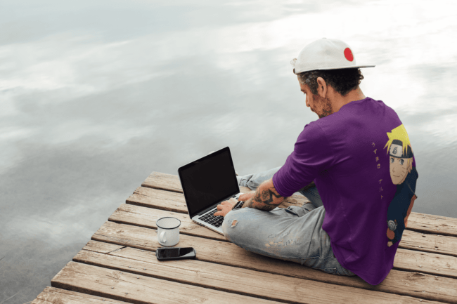 back view tee mockup of a man with an arm tattoo working outdoors m9073 r el2 1