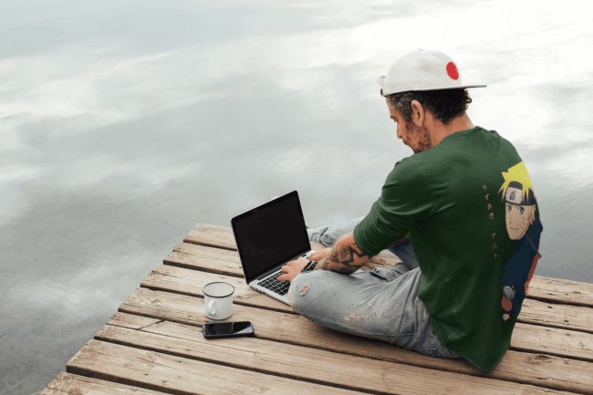 back view tee mockup of a man with an arm tattoo working outdoors m9073 r el2 2