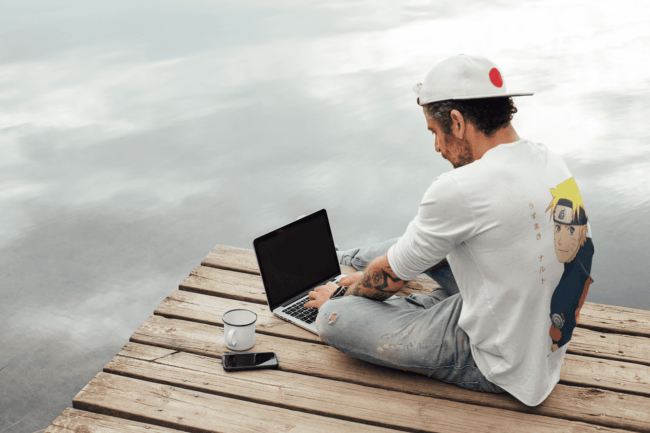 back view tee mockup of a man with an arm tattoo working outdoors m9073 r el2 6