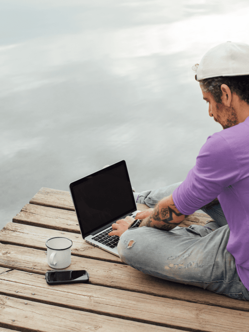 back view tee mockup of a man with an arm tattoo working outdoors m9073 r el2 8