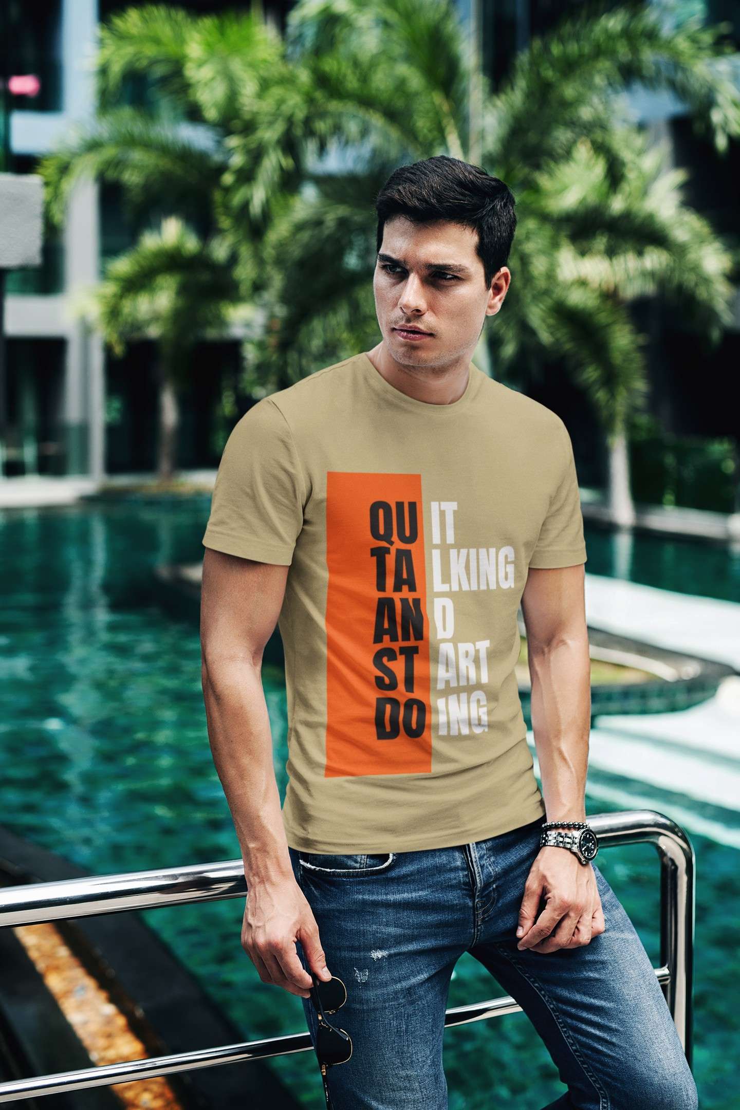 t shirt mockup of a fashionable man posing by a pool 430 el 5