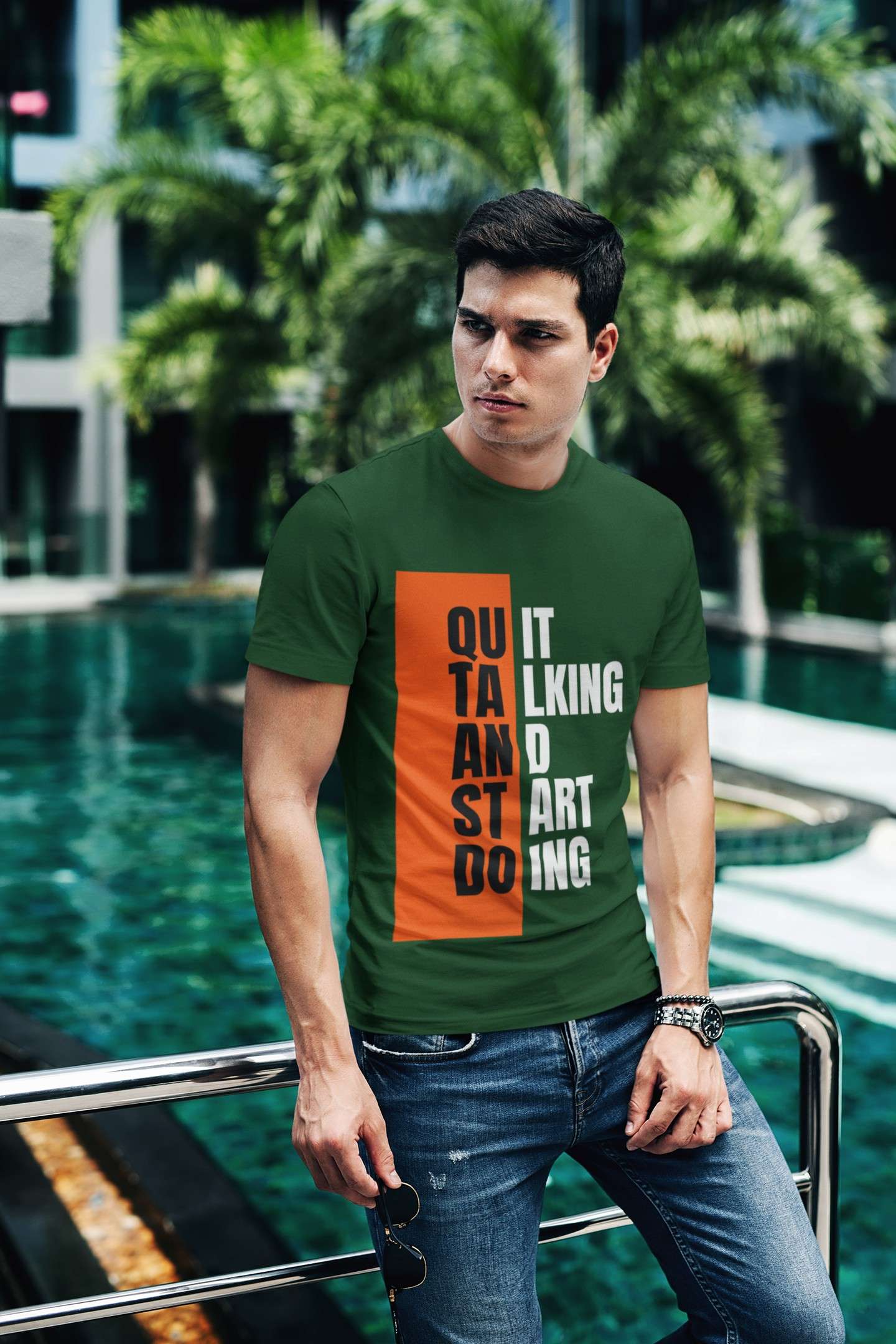 t shirt mockup of a fashionable man posing by a pool 430 el 6