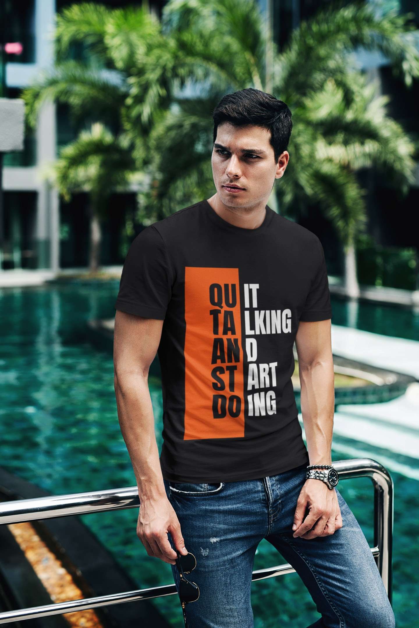 t shirt mockup of a fashionable man posing by a pool 430 el 8