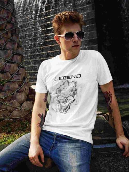 t shirt mockup of a red haired man posing next to a fountain 2191 el1 1